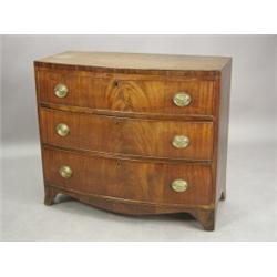 A small 19th century bow fronted chest of drawers having three long drawers on bracket feet, 92cm...
