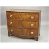 Image 1 : A small 19th century bow fronted chest of drawers having three long drawers on bracket feet, 92cm...