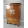 Image 1 : A small 19th century mahogany wardrobe with a pair of double panelled doors over two drawers, on...