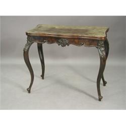 A Victorian rosewood tea table, with a serpentine front and a telescope pull out action, the four...