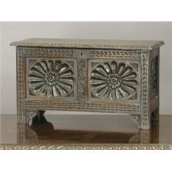 An oak miniature coffer with four flower head panels to the front and side, 44.5cm Est. 120/150...