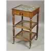 Image 1 : A Victorian mahogany marble top three tier bedside table with a single frieze drawer, with caned...