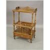 Image 1 : A Victorian walnut canterbury with fretcut decoration and a base drawer, 56cm wide Est. 600/800...