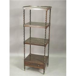 A 19th century rosewood whatnot with four shelves and a base drawer on barley twist supports, 52c...