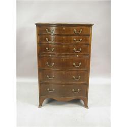 A reproduction mahogany serpentine chest of drawers, 76cm wide Est. 600/800...