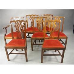 A set of twelve Chippendale style mahogany dining chairs, ten singles and two carvers Est. 1200/1...