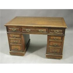 An Edwardian walnut pedestal desk, 122cm Est. 400/500...