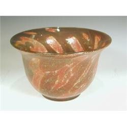 An art glass bowl, with a flared rim, in shades of pink and silver aventurine, 27cm diameter (...