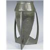 Image 1 : A Liberty pewter vase with relief stylised foliate decoration, designed by Archibald Knox, str...