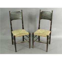 A pair of Arts & Crafts chairs by William Birch, with oak frames and rushed seats Est. 100/...