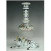 Image 1 : An 18th/19th century French faience figure of a seated cow and a candlestick, both painted wit...
