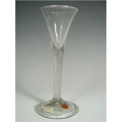 A George III air twist wine glass, with a slight bell shaped bowl on a domed foot, 17cm high<b...