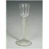 Image 1 : A George III wine glass with a bell shaped bowl and a cushion knop, with an opaque air twist s...