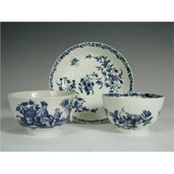 A Worcester teabowl, decorated with oriental figures and vases, crescent mark, and a Worcester...