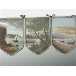 Five late 19th/early 20th century stained glass panels, of shield shape within lead borders de...