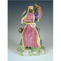 An early 19th century pearlware figure with an applied shield inscribed 'Christ Teacher Nicode...