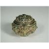 Image 1 : A small gilt metal box cast with floral scrolling decoration and inset with paste, enamels and...