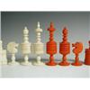 Image 1 : A carved bone chess set, natural and stained red, with an instruction booklet by J & R Maxwell...