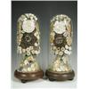 Image 1 : A pair of 19th century shell arrangements under glass domes (damaged), on low mahogany stands...