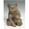 Image 1 : A late 19th century black forest carved bear, with a hinged head and compartment, 22cm high<br...