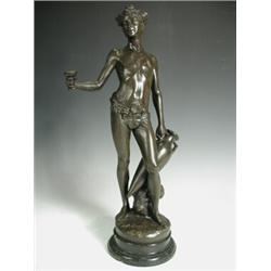 N. Mayer (?) A classical bronze figure of Bacchus holding an amphora and a cup, signed and rai...