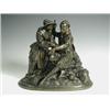 Image 1 : A bronze group depicting a nurse bandaging a soldiers arm, 20cm high Est. 140/180...