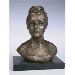 Marie Machen SPS, SWS, a modern bronze cast sculpture of a young lady wearing her hair in a bu...