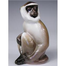A Royal Doulton Chatcull monkey, in seated pose HN 2657, 10.5cm high Est. 50/80...