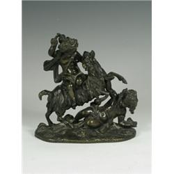 An early 20th century bronze group of two putti playing with a goat, 18cm high Est. 150/250...