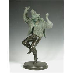 A patinated bronze figure of a dancing Tyrolean man, 38cm high Est. 150/250...