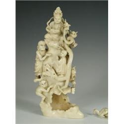 A late 19th/early 20th century Eastern carved ivory tusk section, 22cm high (some damage) E...