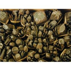 A box containing approximately 340 iron stamps Est. 600/800...
