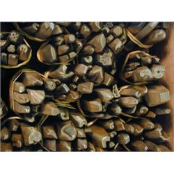 A box containing approximately 250 iron stamps Est. 500/700...