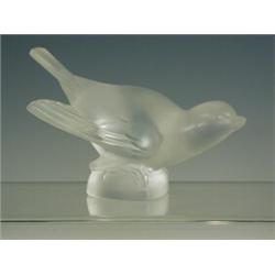 A Lalique glass paperweight in the form of a bird, marked to base, 8cm Est. 150/200...