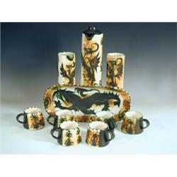 A 1960's/70's Celtic pottery (Cornwall) coffee set, decorated with a lion, birds and stylised...