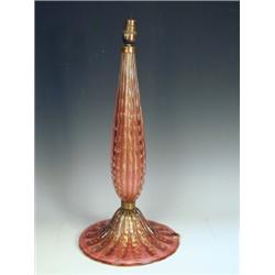 A Barovia and Toso ruby glass table lamp of reeded tapering form, with gold aventurine and air...