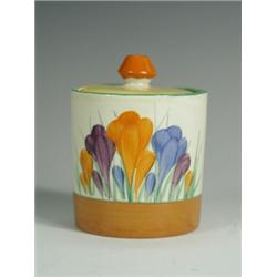 A Clarice Cliff Autumn Crocus pattern preserve pot and cover, 9cm high Est. 80/120...