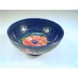 A Moorcroft bowl in the Anemone pattern, impressed marks and blue signature, 16cm diameter ...