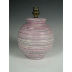 A Carltonware pottery lamp base, of circular form with ribbed decoration, base 18cm high Es...