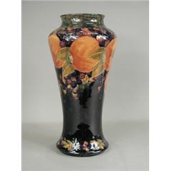 A large Moorcroft vase in the Pomegranate pattern with a painted and impressed mark, 39cm (two...
