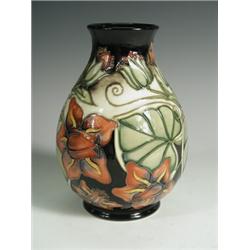 A contemporary Moorcroft vase, impressed and printed marks, 19cm Est. 60/90...