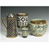 Image 1 : Four Doulton Lambeth items: a jug with a plated lid, 29cm, a jardiniFre with incised grotesque...