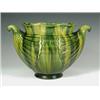 Image 1 : An Ault green glazed jardiniFre, designed by Christopher Dresser, with two conch shaped moulde...