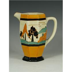 A Clarice Cliff Fantasque Bizarre Athens jug, in 'the Orange Tree and House pattern', printed...