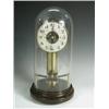 Image 1 : A 1920's Bulle electric dome clock, the battery housed in a central brass pillar on a turned m...