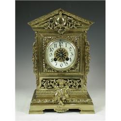 An Edwardian pierced brass mantel clock, 32cm high Est. 150/180...