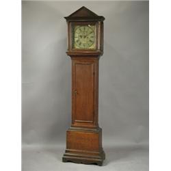 An 18th century oak longcase clock, the 12 inch brass dial with subsidiary seconds and calenda...