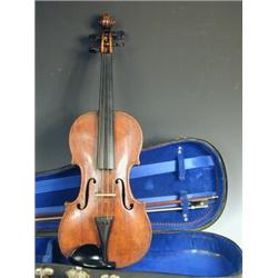 A violin with a one piece back labelled Nicolaus Amati..., with a bow stamped W.E. H & S., in...