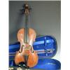 Image 1 : A violin with a one piece back labelled Nicolaus Amati..., with a bow stamped W.E. H & S., in...
