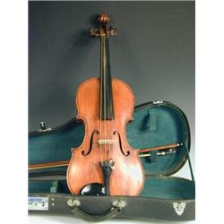 A French violin with a figured two piece back, labelled Leon Bernardel 1899 Paris the bow stam...